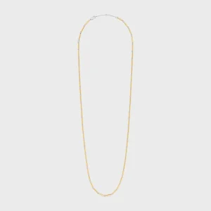 Långt halsband med berlocker i mässing med guld- och rodiumfinish