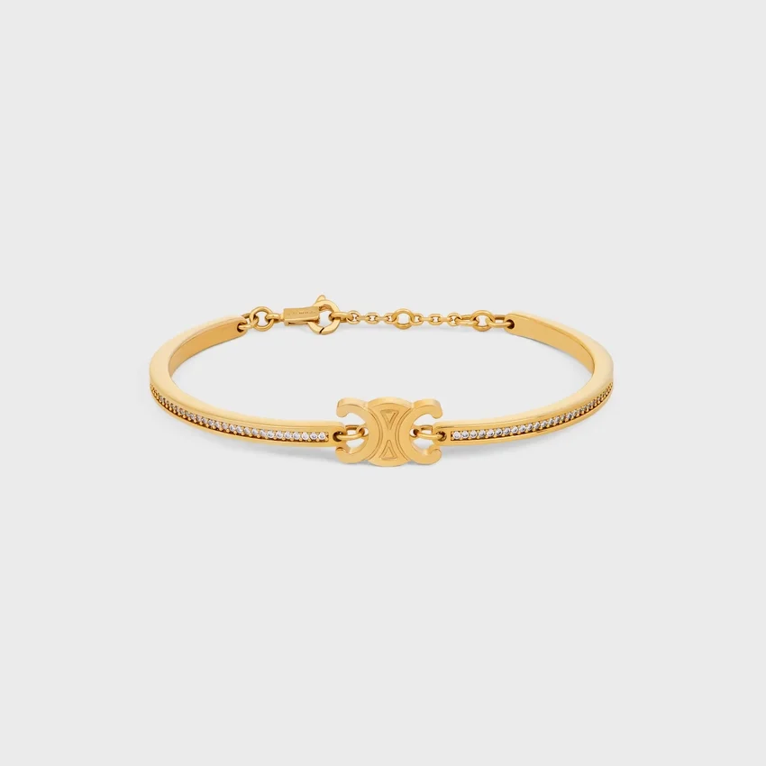 Triomphe ledat glittrande armband i strass och mässing med guldfinish - Bild 2